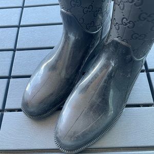 Gucci womens rubber GG monogramed knee high boots